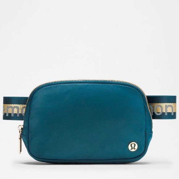 lululemon athletica Handbags - Lululemon Everywhere Belt Bag Wordmark Crossbody Bag in Warp Teal & Gold NWT